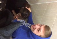 Filmed on camera as a classmate giving a blowjob in the toilet