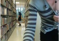 Hot asian strips in library with friend