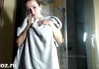 Busty female caresses pussy in the shower