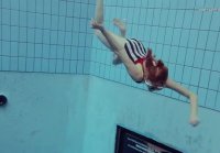 Swimmer Nastya likes to swim completely naked underwater