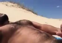 Idiota Griego Peludo en la playa