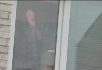 Naked mom washes window son spies on mommy. Naked in public.