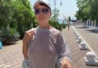 Lada walks in transparent clothes