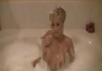 Blonde takes a bubble bath