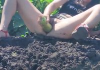 Masturbation with zucchini in the field