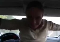 Husband films wife in car