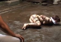 Japanese girl tied up in mud naked