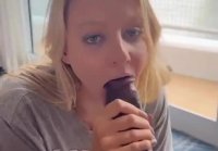 The girl diligently sucks a big black dick