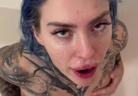 Pissing in the mouth of a girl with a tattoo