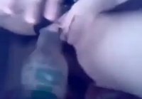 Fucking a girl with a bottle she likes it